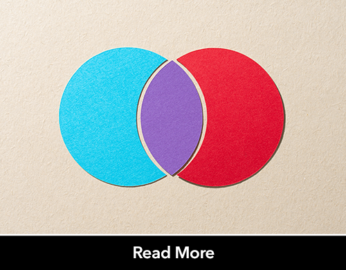 overlapping pieces of multicolored paper to look like a venn diagram